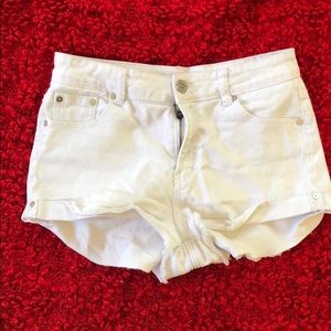 Distressed white mini shorts